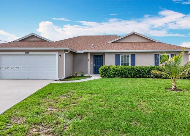 Property at 6142 NW Hopkins Ave, Port St. Lucie, FL 34986, 4 beds, 3 baths