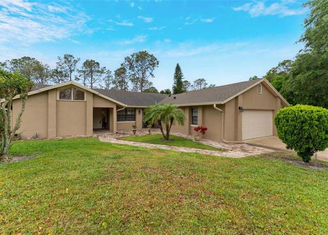 Property at 9056 Woodbreeze Blvd, Windermere, FL 34786, 4 beds, 2 baths