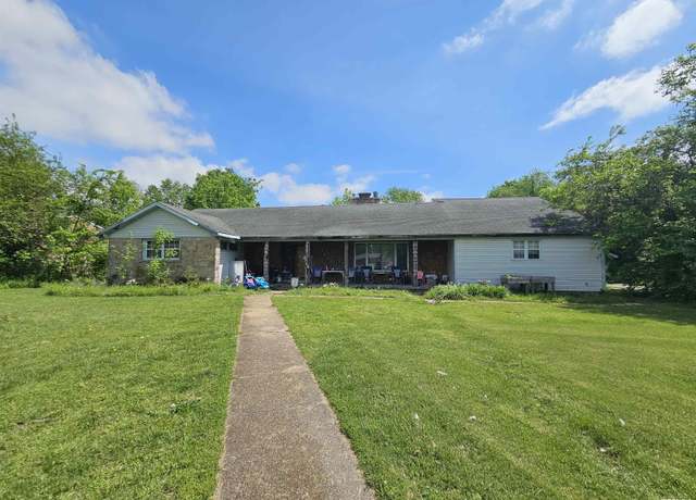 Property at 1429 W 10th St, Metropolis, IL 62960, 5 beds, 3 baths